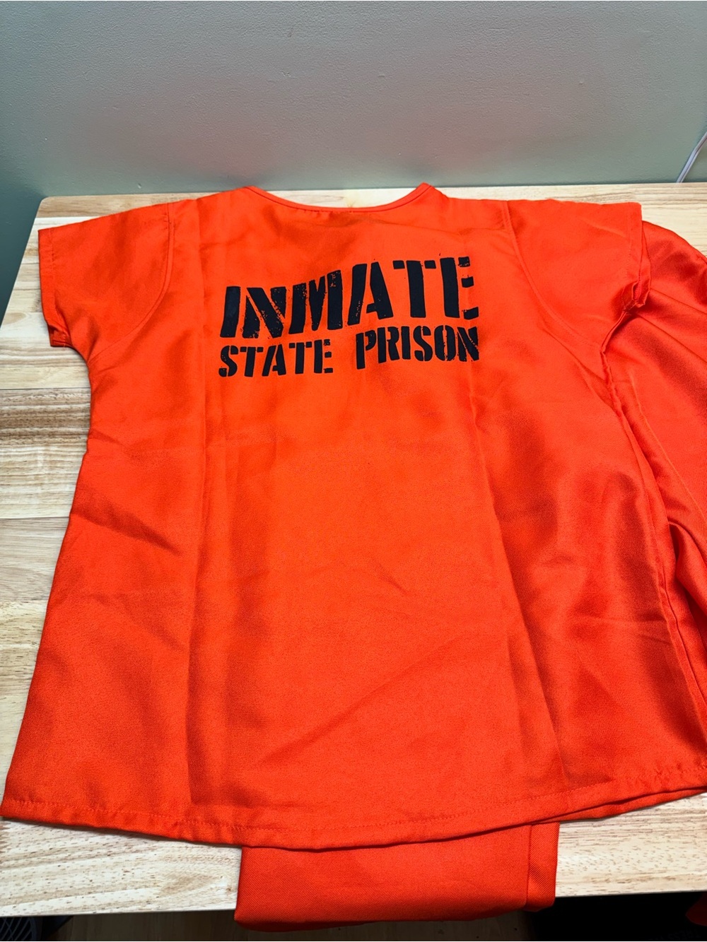 Adults Orange 'Inmate State Prison' Halloween costume size small
